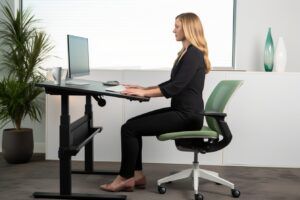 woman sitting in an upright position