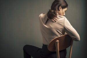 woman cracking her back